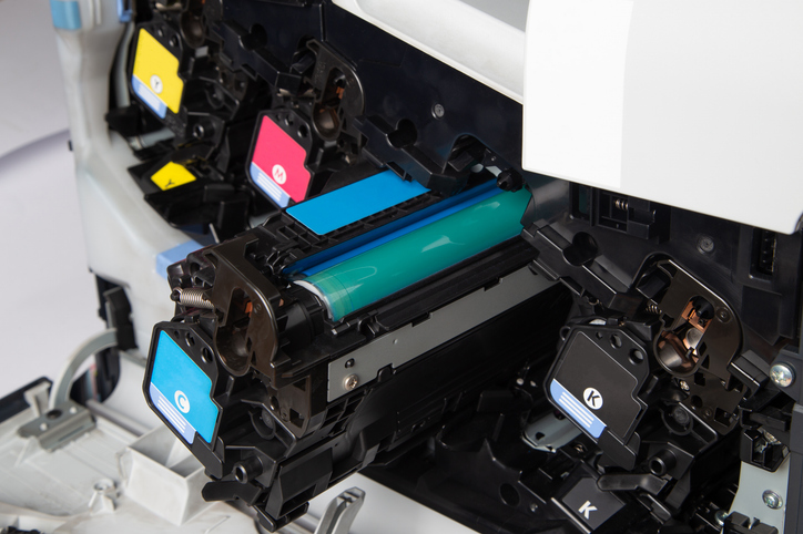 Close Up Shot Of CMYK Ink Cartridges For Laser Printer.